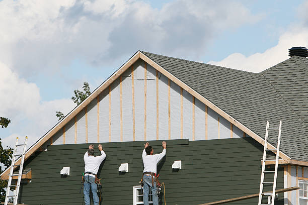 Professional Siding Contractor technician working in Medina, NY